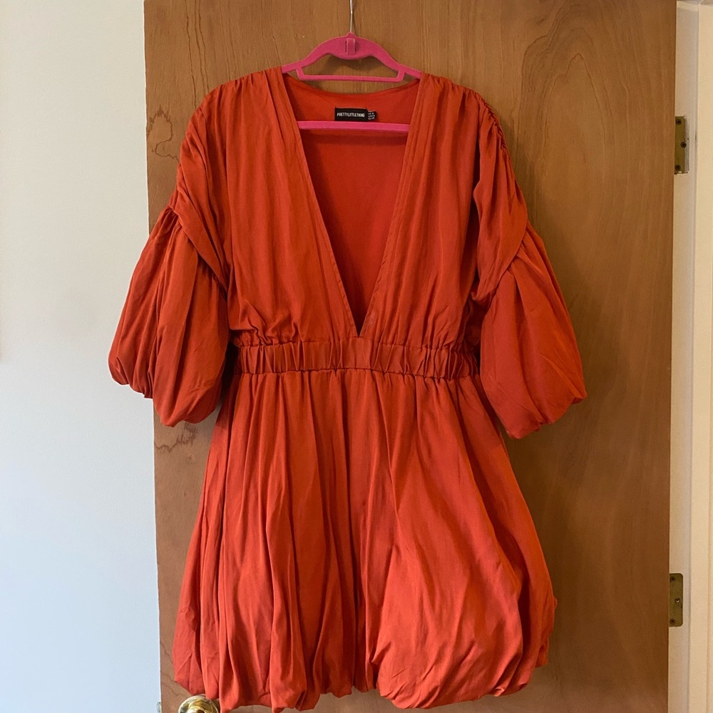 PrettyLittleThing Bold Orange Puff Sleeve Mini Dress
